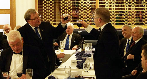 Harry Waggett (left) toasts the master Robert Marsden in song. Harry Waggett (left) toasts the master Robert Marsden in song.