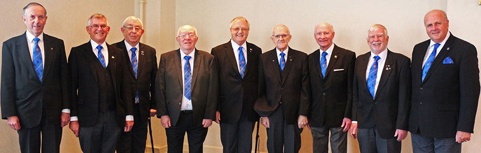 David Winder (far right) looks on as the lodge’s 50 plus years’ service club welcomes its newest member Alan (4th left).