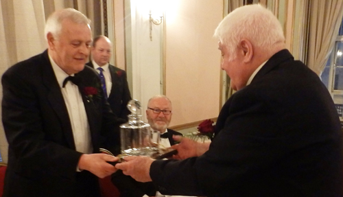Jim Horne (right) makes a presentation to Barrie. Jim Horne (right) makes a presentation to Barrie.