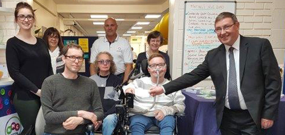 Dave Douglas (right) with staff and out patients. Dave Douglas (right) with staff and out patients.