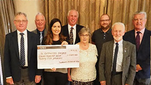 Pictured from left to right, are: Raymond Cookson, Tom Oakes, Hayley Jackson (receiving the cheque for St Catherines Hospice), Ian Heyes, Elizabeth Bridge, Chris Hughes, Eric Nixon and Bryan Hoarty. Pictured from left to right, are: Raymond Cookson, Tom Oakes, Hayley Jackson (receiving the cheque for St Catherines Hospice), Ian Heyes, Elizabeth Bridge, Chris Hughes, Eric Nixon and Bryan Hoarty.