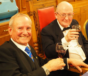 David Walmsley (left) taking wine with new master John Davies. David Walmsley (left) taking wine with new master John Davies.