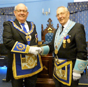 lan Carter (right) welcomes Philip Gunning lan Carter (right) welcomes Philip Gunning