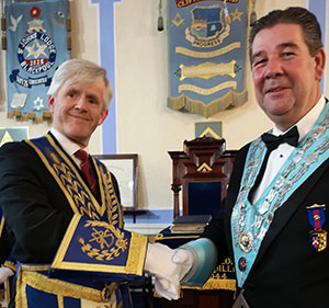 Ian Ward (left) congratulates Mark Hellis.