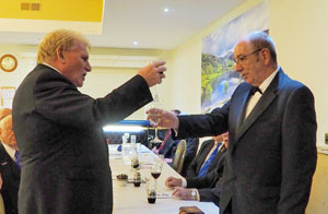 Kit Keefe (left) concluding the master’s song to John Aplin. Kit Keefe (left) concluding the master’s song to John Aplin.