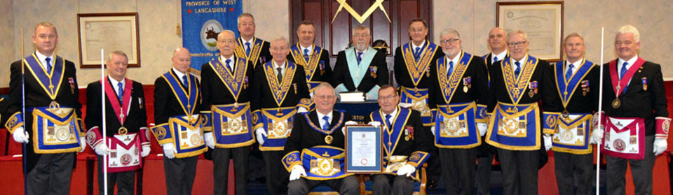 Gordon and Steward (sat) and to the rear, WM Malcolm Timms (centre) together with grand officers and acting Provincial grand officers.