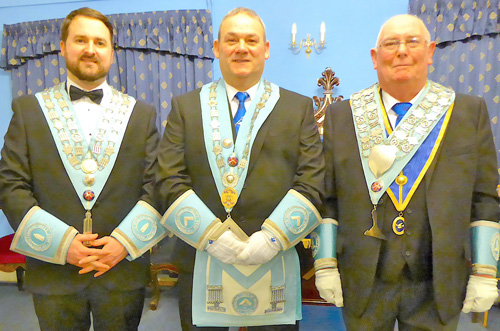 The newly installed WM and his wardens. Pictured from left to right, are: Edward Hanna (SW); Stephen Booker and Michael Daly (JW). The newly installed WM and his wardens. Pictured from left to right, are: Edward Hanna (SW); Stephen Booker and Michael Daly (JW).