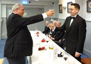 John Darrell (left) toasts Glen Brooks during the master’s song. John Darrell (left) toasts Glen Brooks during the master’s song.