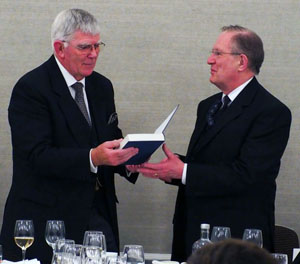 Tony Harrison (left) receives his memento from Graham Redman. Tony Harrison (left) receives his memento from Graham Redman.