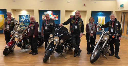 The bikes in the school hall waiting for the children.