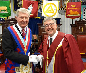 Stuart Thornber (left) congratulates Hugh Mett. Stuart Thornber (left) congratulates Hugh Mett.