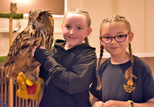 Pictured from left to right, are; Tia and Ruby with eagle owl Clyde. Pictured from left to right, are; Tia and Ruby with eagle owl Clyde.