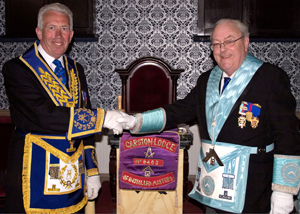 Mark Mathews (left) offers his congratulations to the new WM, Paul Baines. Mark Mathews (left) offers his congratulations to the new WM, Paul Baines.
