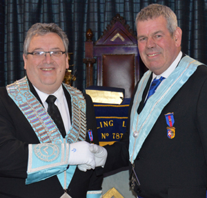 Installing Master John Eccles (right) congratulates his successor Andrew Jones on again becoming Master of Pilling Lodge. Installing Master John Eccles (right) congratulates his successor Andrew Jones on again becoming Master of Pilling Lodge.