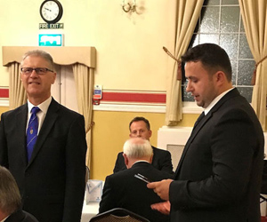 David Hobbs DC (left), supporting Blerim Suti during his toast to the founders of the lodge. David Hobbs DC (left), supporting Blerim Suti during his toast to the founders of the lodge.