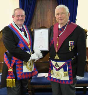 Tony (left) with Jon proudly holding his commemorative certificate. Tony (left) with Jon proudly holding his commemorative certificate.