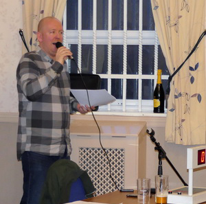 Quizmaster and MC Mark Pedder at the mic. Quizmaster and MC Mark Pedder at the mic.