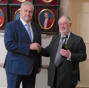 Andy Whittle (left) presents Colin Roberts with his gift. Andy Whittle (left) presents Colin Roberts with his gift.