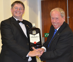 Peter Pemberton (right) receiving the winning prize from Stewart Aimson. Peter Pemberton (right) receiving the winning prize from Stewart Aimson.