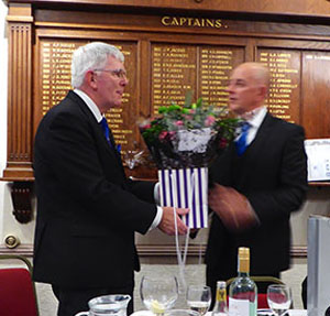 Tony presented with the bouquet of flowers. Tony presented with the bouquet of flowers.