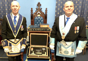 Ian McGovern (left) and Alan Routledge receive the gold-plated working tools Ian McGovern (left) and Alan Routledge receive the gold-plated working tools