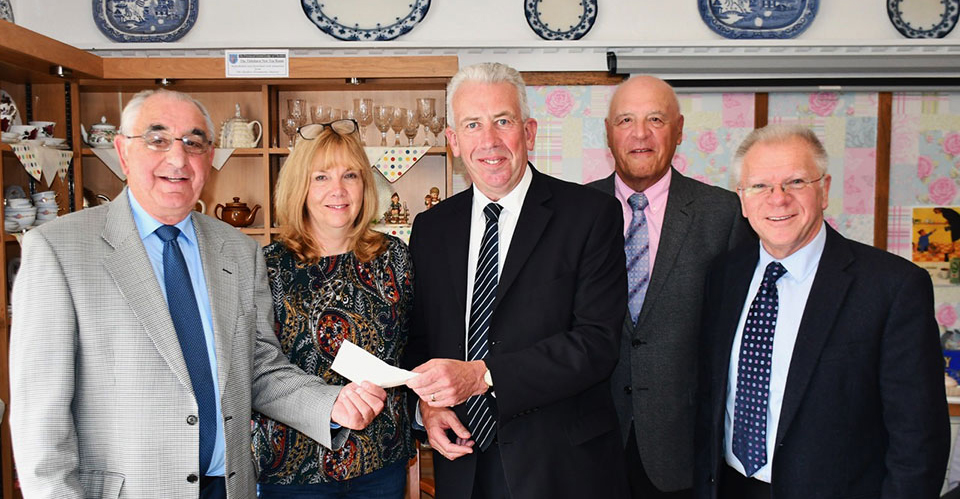 Pictured from left to right, are: John Stallard, Linda Johnson, Mark Matthews, Steve Kayne and Derek Parkinson at the cheque presentation. Pictured from left to right, are: John Stallard, Linda Johnson, Mark Matthews, Steve Kayne and Derek Parkinson at the cheque presentation.