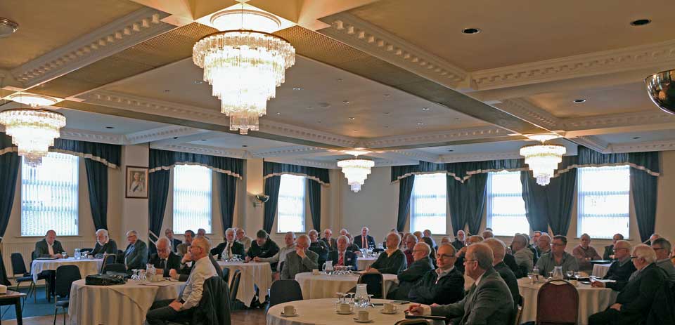 The delegates listening and making notes. The delegates listening and making notes.
