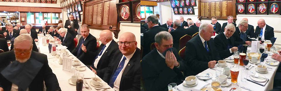 The diners enjoy a hearty festive board. The diners enjoy a hearty festive board.