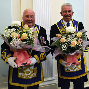 Peter Levick (left) and Mark Matthews with the floral bouquets. Peter Levick (left) and Mark Matthews with the floral bouquets.