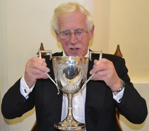Adrian Gifford taking a rather large gulp of Port from the ‘Loving Cup’. Adrian Gifford taking a rather large gulp of Port from the ‘Loving Cup’.