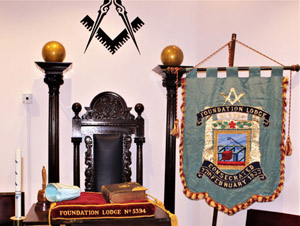 The lodge cushion and banner. The lodge cushion and banner.