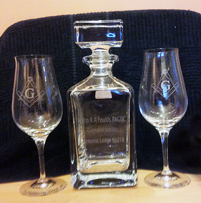 The engraved decanter presented to Tony. The engraved decanter presented to Tony.