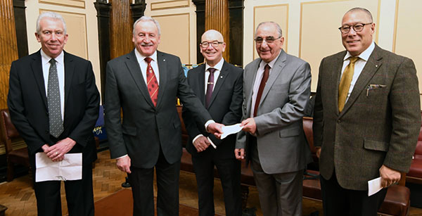 Pictured from left to right, are: Mark Matthews, Sam Robinson, Phil Pattulo, Joe Stallard of Friends of Tithebarn and Jorge Perez who organised the sponsored walk.