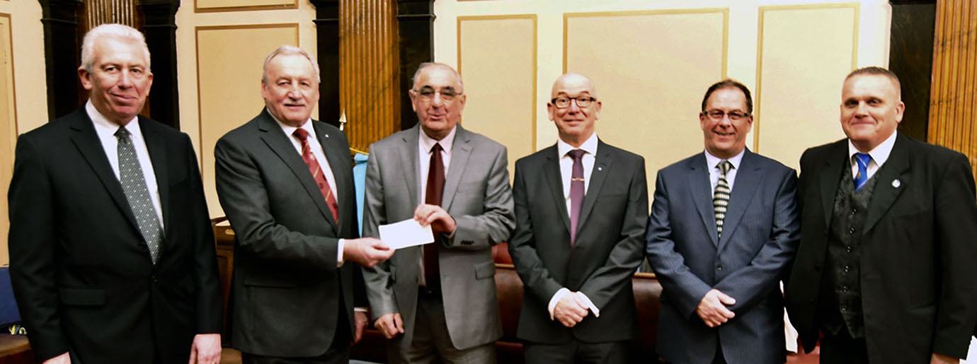 Pictured from left to right, are: Mark Matthews and Sam Robinson presenting a cheque to Joe Stalled, with golfers Phil Pattulo, Tommy Walsh and Geoff Brown. Pictured from left to right, are: Mark Matthews and Sam Robinson presenting a cheque to Joe Stalled, with golfers Phil Pattulo, Tommy Walsh and Geoff Brown.