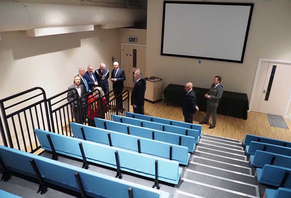 The team are pictured in the theatre, which is about to undergo modernisation and expansion. The team are pictured in the theatre, which is about to undergo modernisation and expansion.
