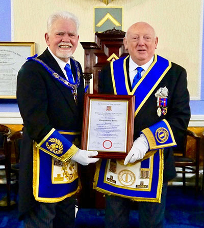 David Randerson (left) and George Holden with his commemorative certificate. David Randerson (left) and George Holden with his commemorative certificate.