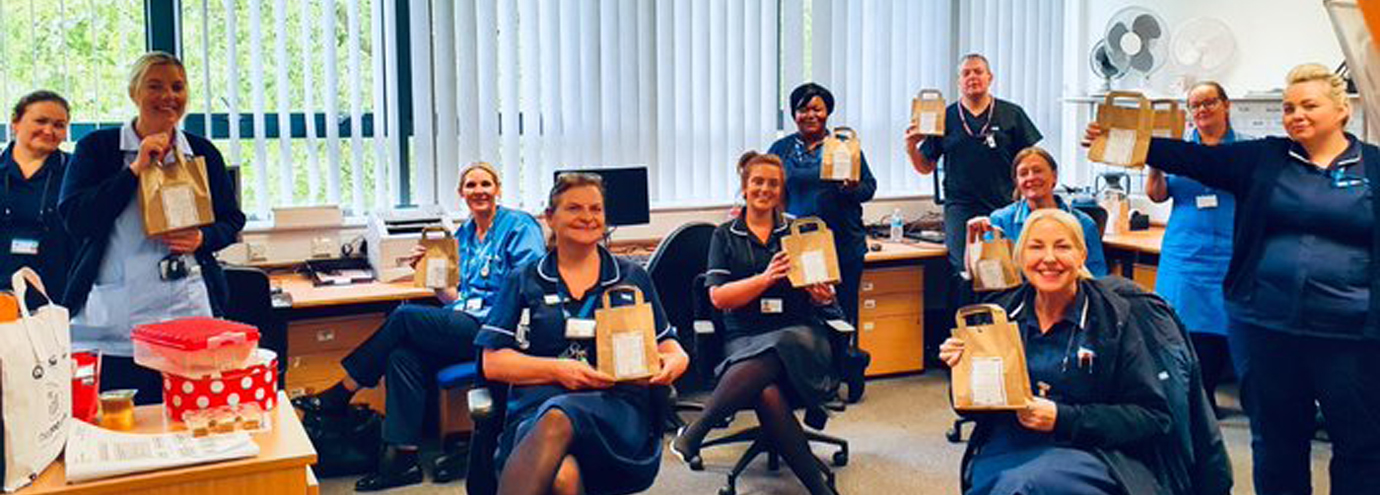 The staff at Mersey Care in Litherland gather round to say thank you for their treats. The staff at Mersey Care in Litherland gather round to say thank you for their treats.