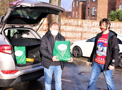 Hand and Heart Lodge No 4109 WM Steve Masters (left) and Alex Wood loading up the first delivery. Hand and Heart Lodge No 4109 WM Steve Masters (left) and Alex Wood loading up the first delivery.