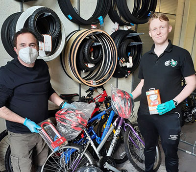 Colin Southern (left) with one of the Bike Works engineers. Colin Southern (left) with one of the Bike Works engineers.