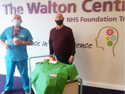 Taking delivery. Professor Paul May (left), Consultant Neurosurgeon and Jim Corcoran. Taking delivery. Professor Paul May (left), Consultant Neurosurgeon and Jim Corcoran.