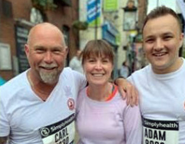 Carl Daggers (eft) with Adam Dennett (right) and a fellow runner at the Manchester 10K. Carl Daggers (eft) with Adam Dennett (right) and a fellow runner at the Manchester 10K.