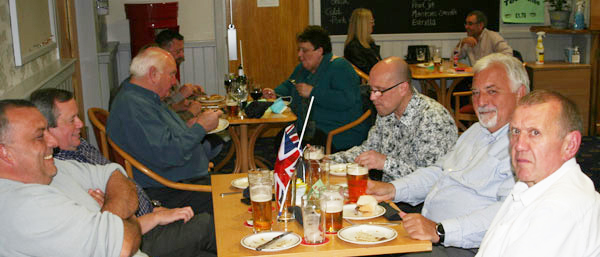 Members enjoying their pie and a pint