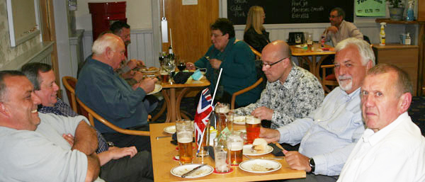 Members enjoying their pie and a pint Members enjoying their pie and a pint