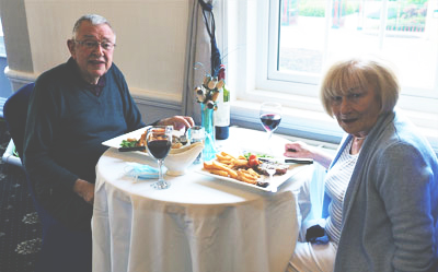 Adrian Bromiley (left) and Pat Andrews enjoying their steak dinner. Adrian Bromiley (left) and Pat Andrews enjoying their steak dinner.