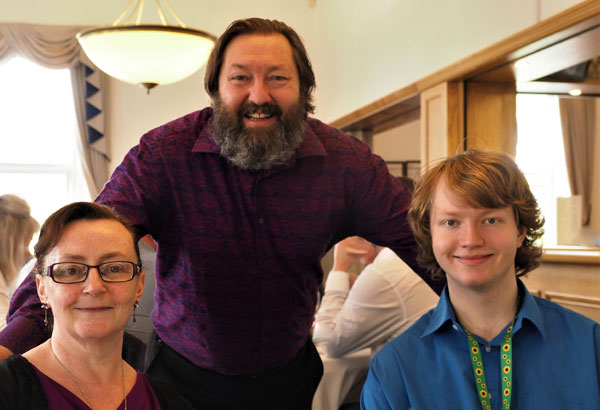 Terry Stevens-Lewing (standing) with his wife Tina (left} and son John-Luke. Terry Stevens-Lewing (standing) with his wife Tina (left} and son John-Luke.