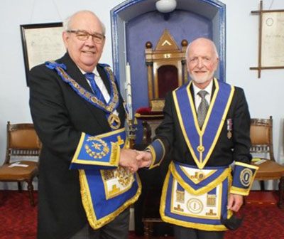 Philip Gunning (left0 congratulating Brian Howson. Philip Gunning (left0 congratulating Brian Howson.