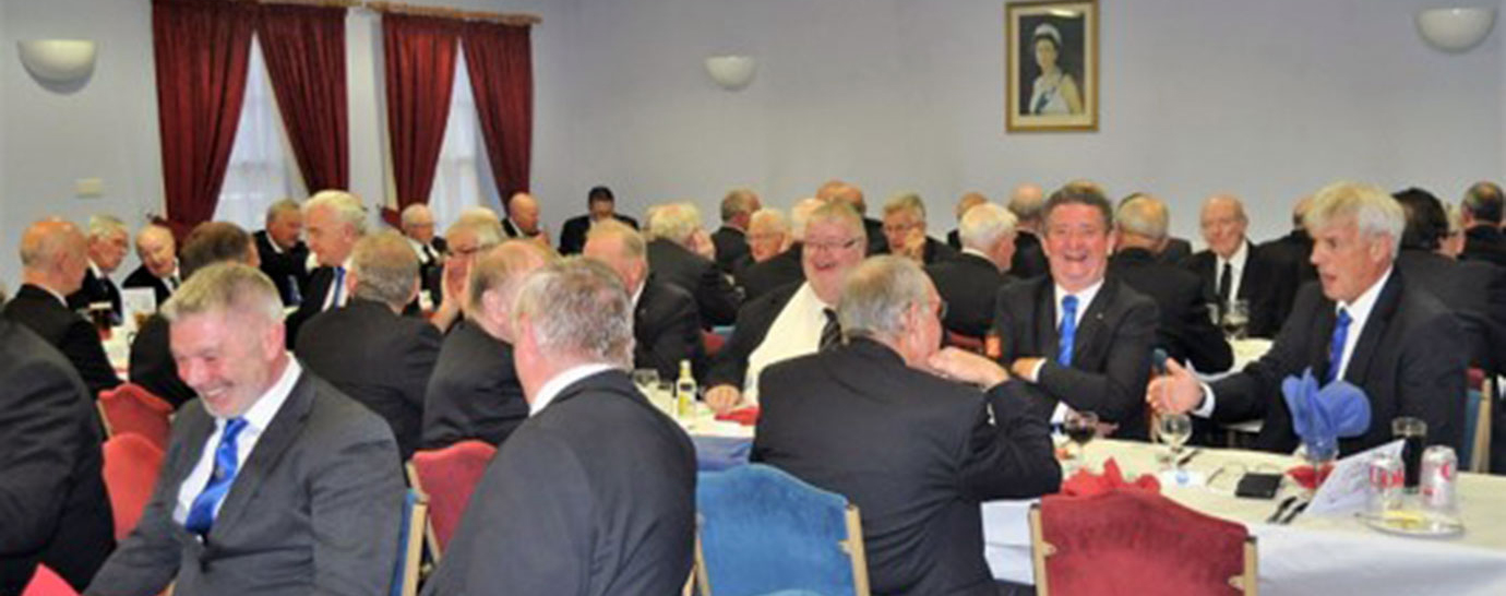Guests assemble for the celebratory festive board.