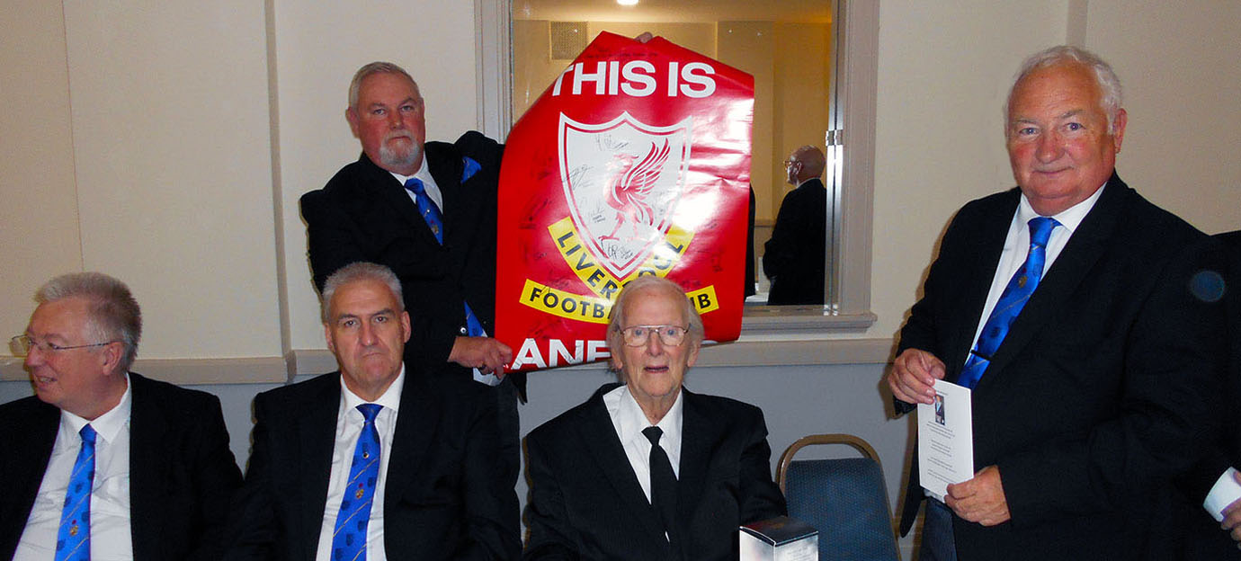 The signed Liverpool Football Club poster presented to Ken Jones at the festive board.
