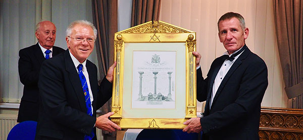 Presentation of the magnificently-framed Grand Lodge Certificate of Herbert Henry Vickers. Presentation of the magnificently-framed Grand Lodge Certificate of Herbert Henry Vickers.