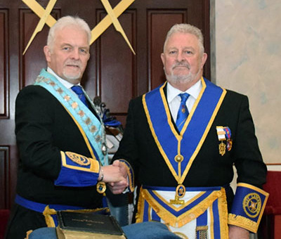The new WM David being congratulated by the installing master Bryn